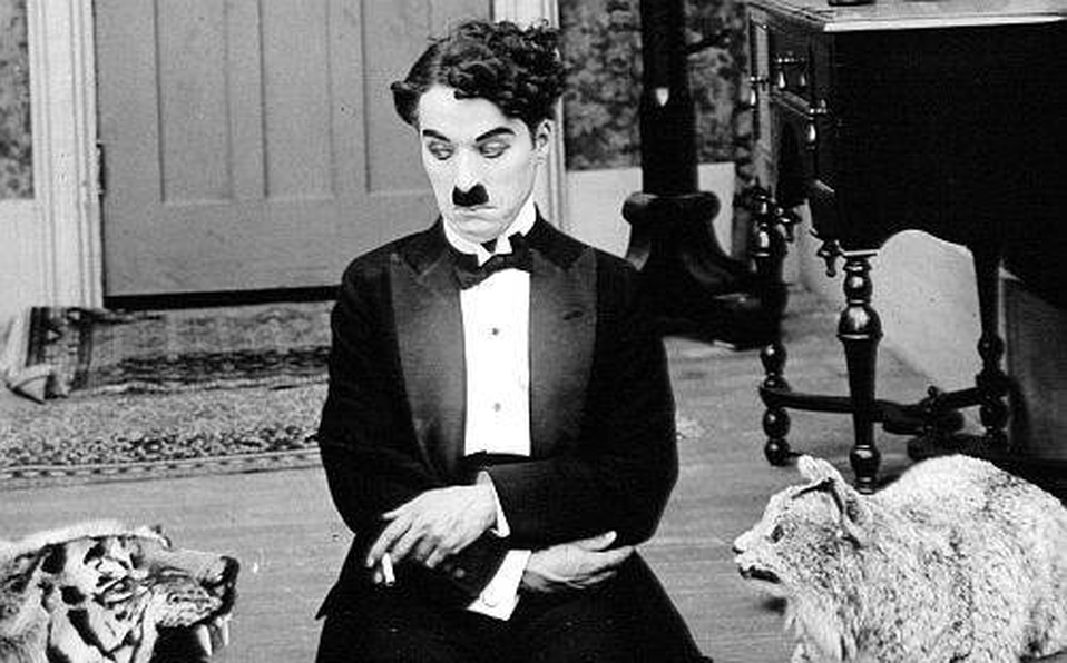 Carlitos Chaplin (a) Sir Charles Spencer Chaplin
